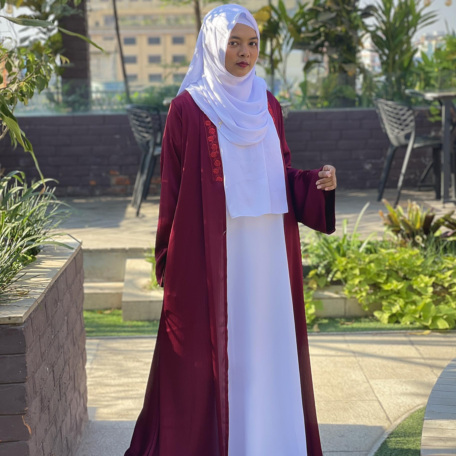 female student abaya and gown